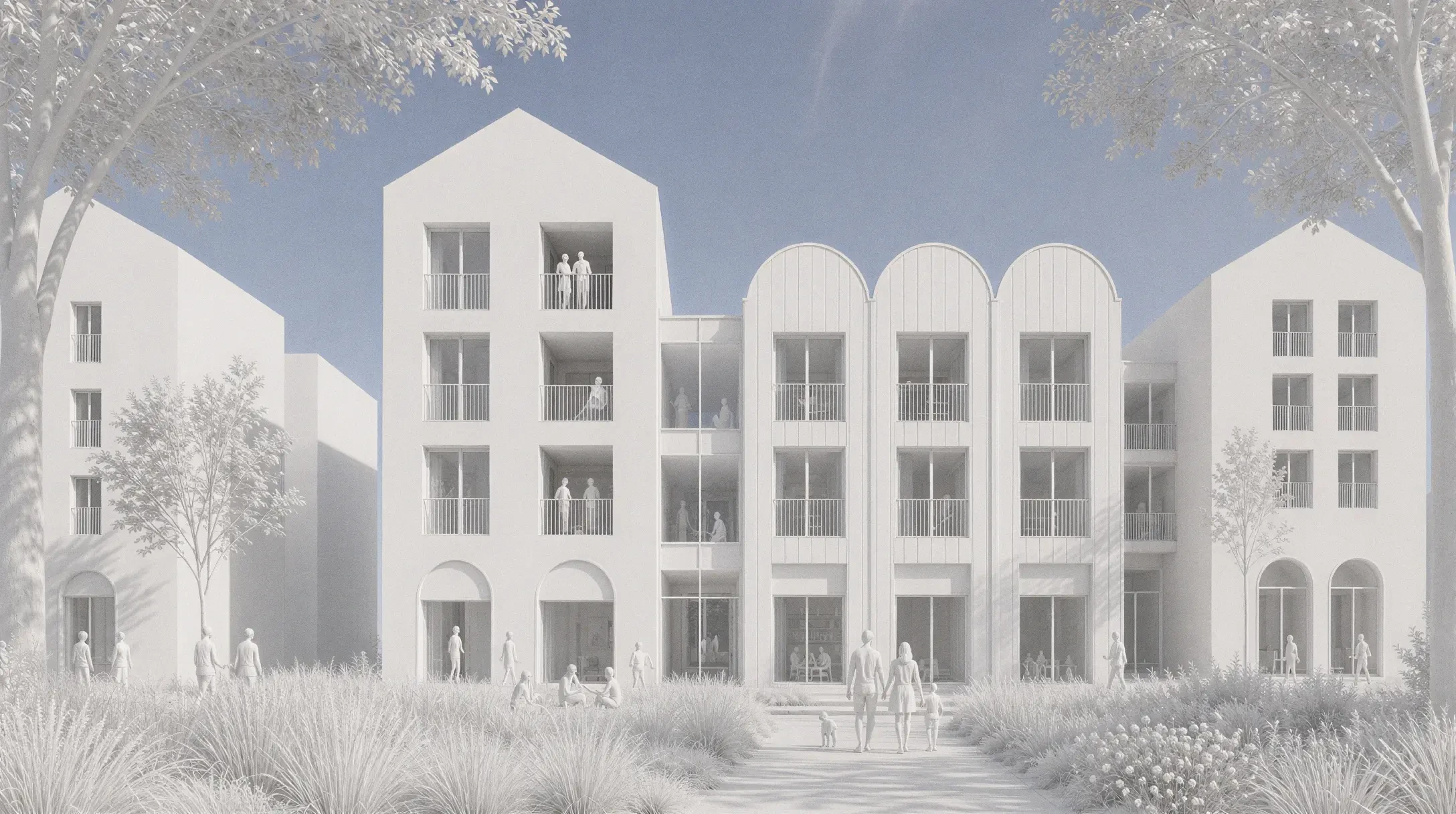 White modern residential buildings with cylindrical tower forms and uniform fenestration in minimalist architectural style.