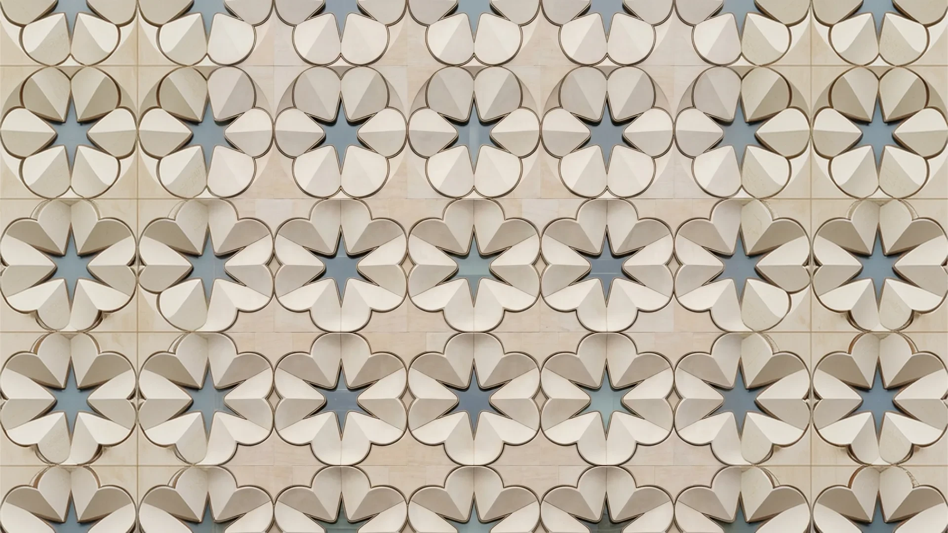 Cast stone petal tiles tessellated in relief, stars glazed between them
