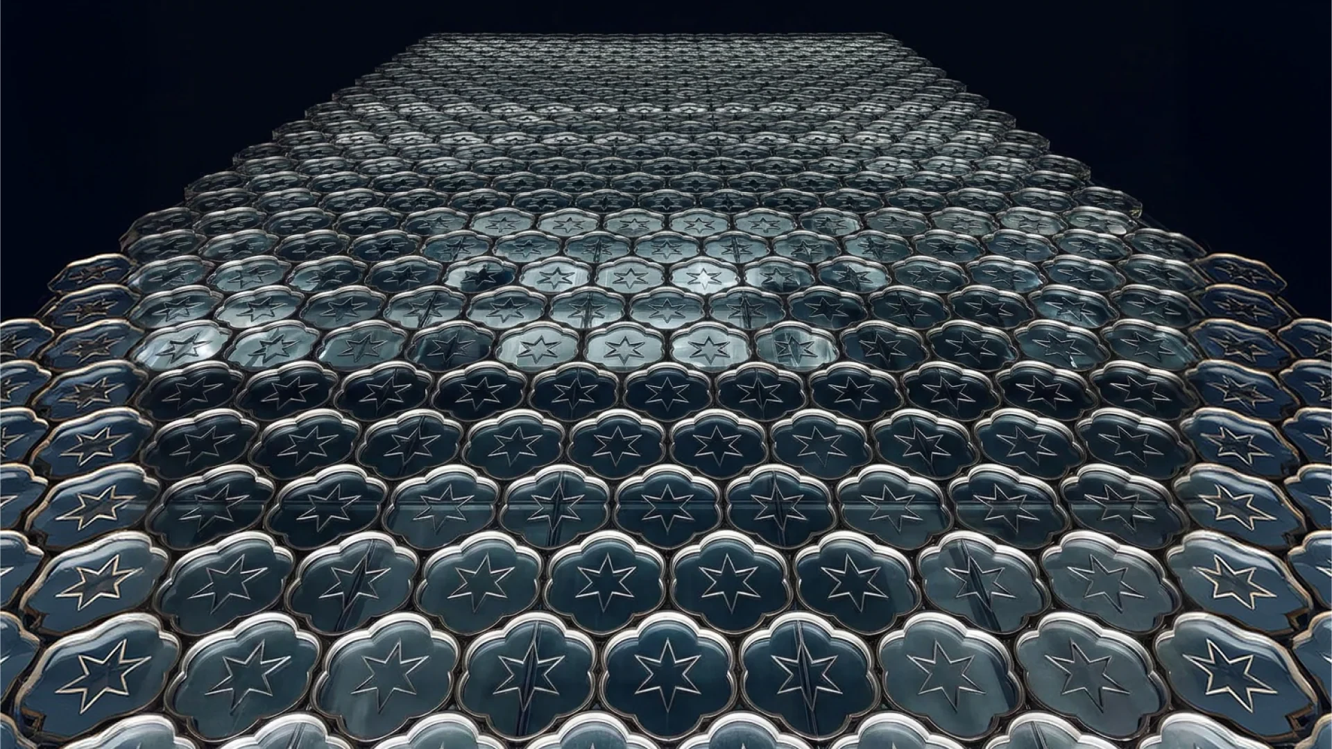 Glass petal shingles climbing a tower at night, a star in every scale